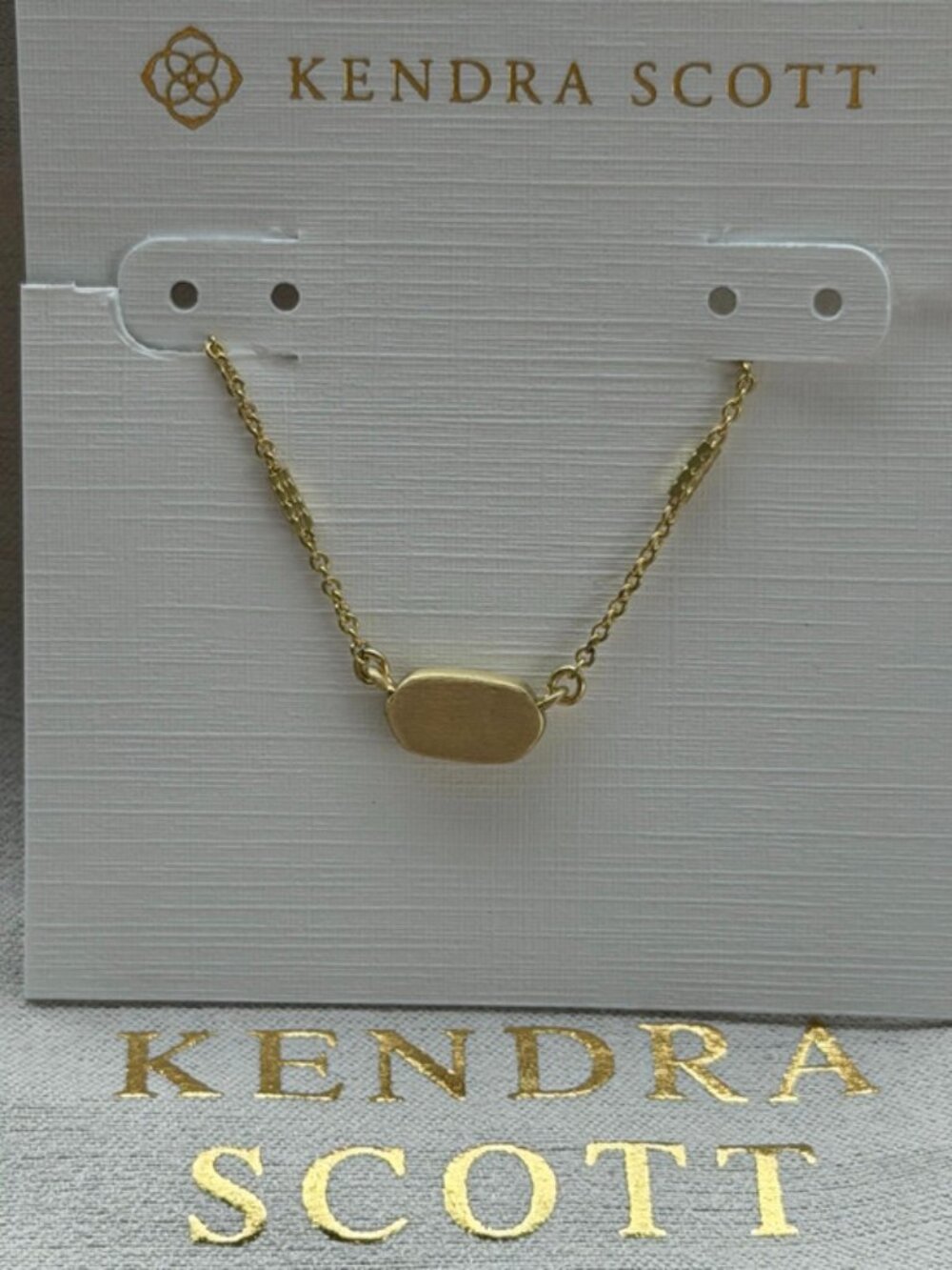 Kendra Scott gold necklace